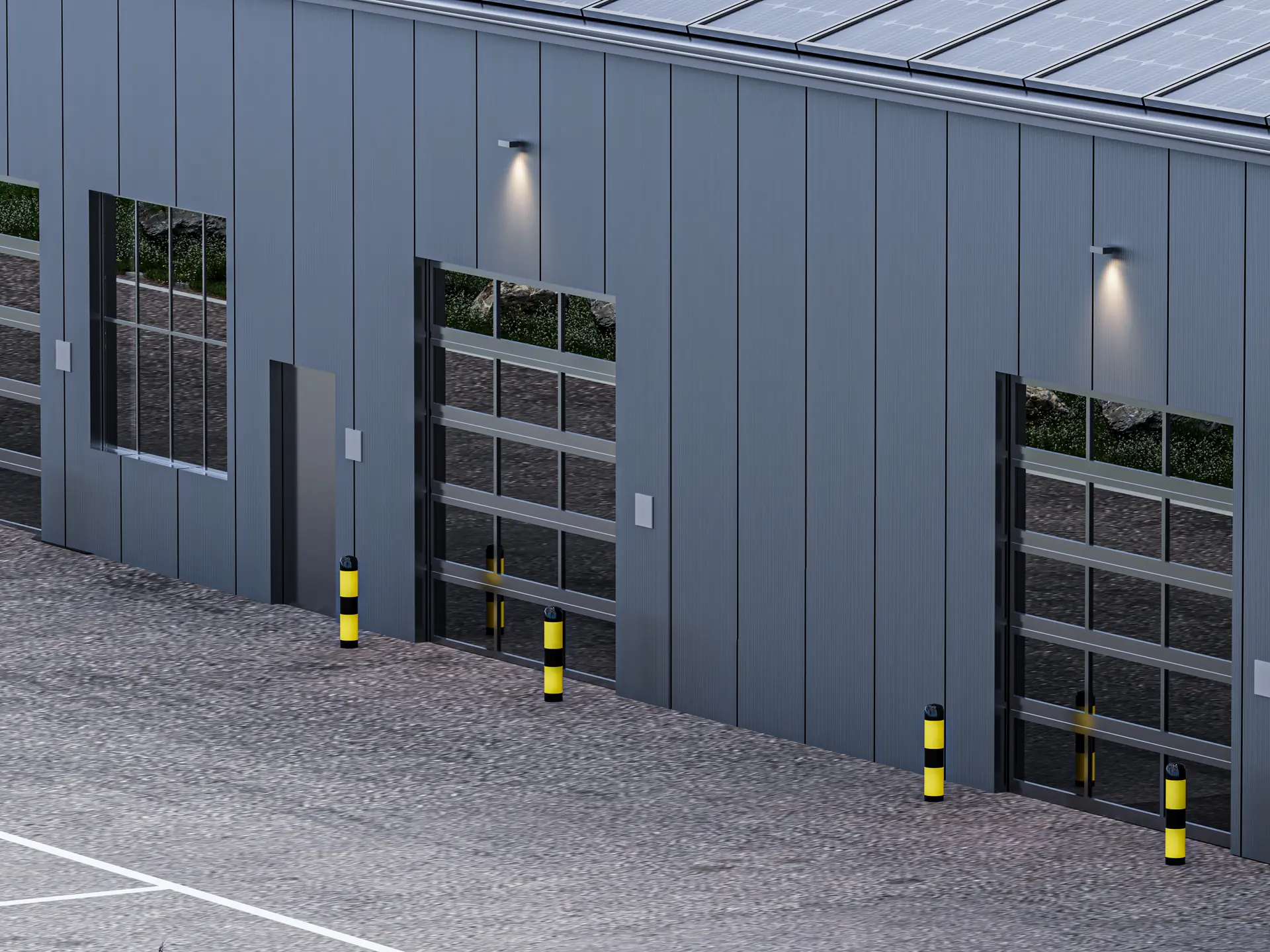 Die Fassade bei Gewerberaum 5: Tor beziehungsweise Türe mit Fensterfront, Prallschutzpfosten und Hofbelag davor