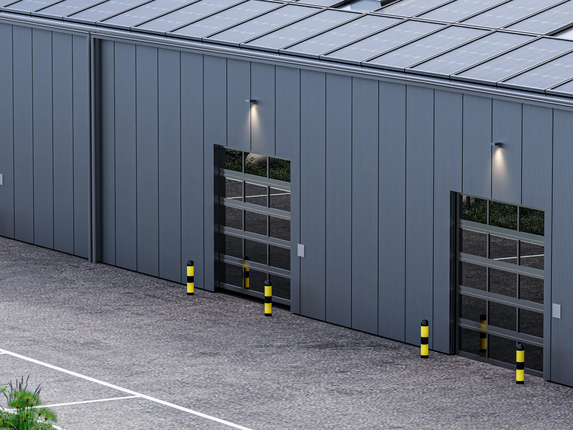 Die Fassade bei Gewerbehalle 3: Sektionaltor mit transluzenten Füllungen, Prallschutzpfosten und Hofbelag davor